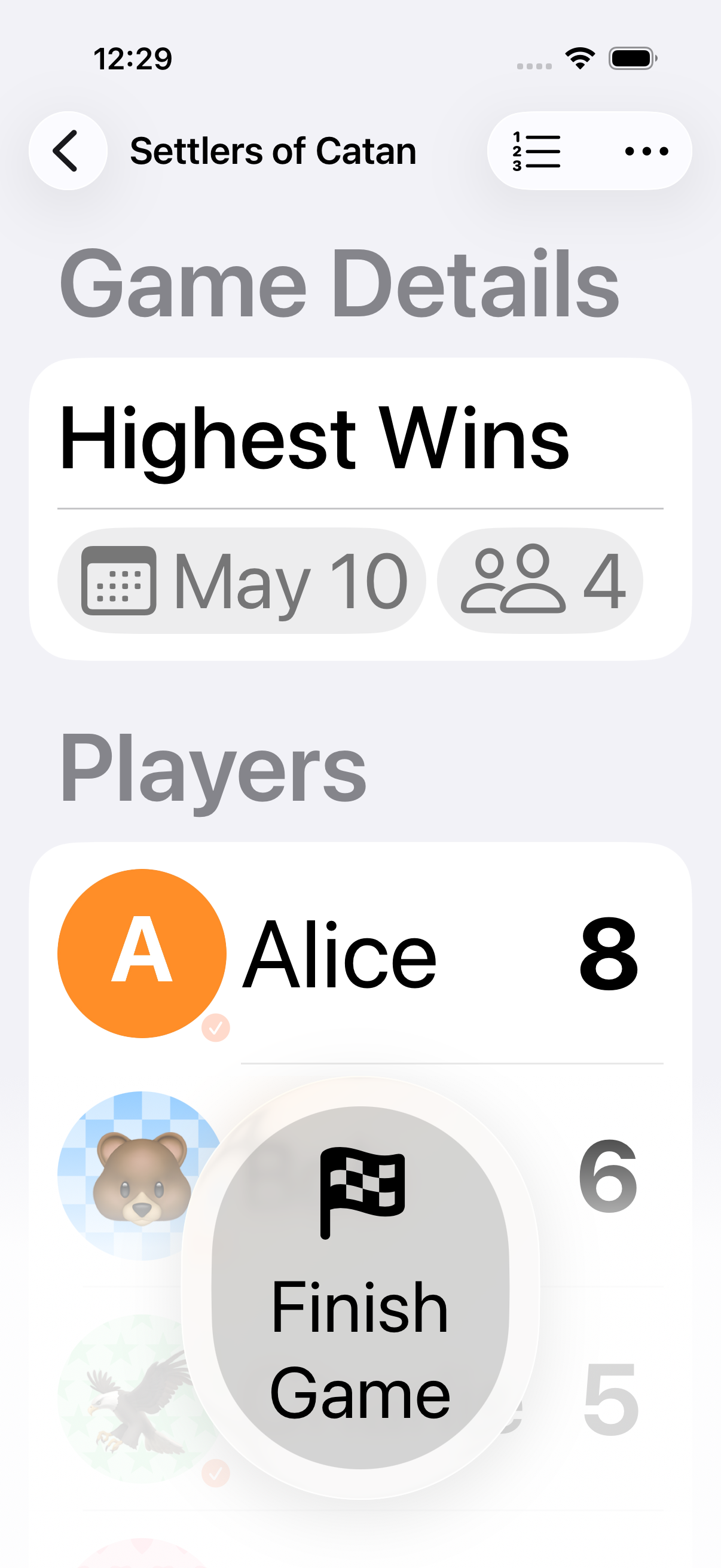 Gameplay at an accessibility text size — names shorten to initials, buttons grow, and rows reflow to stay readable